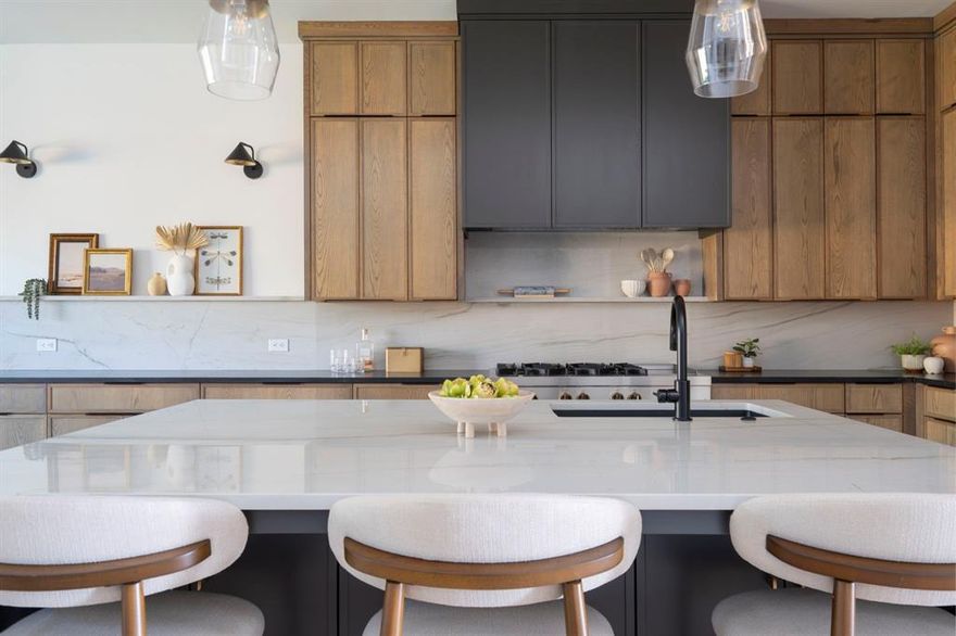 Welcome to Dove Station, a boutique luxury community where charm, comfort, and convenience come together seamlessly. Nestled in the heart of Grapevine and zoned to the award-winning Carroll ISD, this stunning 4-bedroom, 4-bathroom home offers 3,237 square feet of thoughtfully designed living space. At the heart of the home is an expansive open-concept kitchen, perfect for gathering with friends and family. Designed for both everyday living and elevated entertaining, the kitchen features high-end finishes, ample storage, and a large island that flows effortlessly into the main living and dining areas.

Upstairs, a spacious game room invites relaxation and play, while a versatile bonus room adds extra flexibility—ideal as a media room, home office, or fitness space. Every detail has been curated with both style and functionality in mind, from the smart layout to the luxury finishes. Located just steps from Grapevine’s vibrant shops, restaurants, and entertainment, Dove Station offers the perfect blend of peaceful neighborhood living and dynamic city access. Live in luxury. Thrive in Carroll ISD. Welcome home to Dove Station.