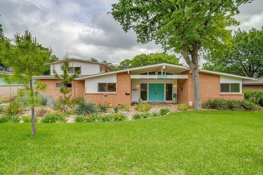Are y'all ready to time travel?? MCM lovers rejoice! 1525 Jenson is just fabulous in every way. From the funky cool exterior with period appropriate paint colors to the insane basically untouched interior to the backyard with all the Palm Springs vibes! When you enter the home, you are immediately wrapped in warmth with the dramatic wood double doors and formal foyer. From there, you can go to the right where 3 bedrooms flank the right side of the home with the master being tucked away on the back corner. You will be mesmerized with the original colorful bathrooms featuring butter yellow and dusty pink fixtures! To the left of the foyer, you enter the most adorable kitchen with so many original features and charm for days. Directly behind the foyer is the literal heart of the home, the den. The brick fireplace anchors one side of the room while the glass wall overlooking the patio and backyard give you a view you will never tire of! And speaking of the patio, it's huge! Truly an extension of the home, this is what outdoor living was made for. The backyard may be in winter mode right now but you will LOVE the deck and above ground pool this Summer. Lush landscaping, room for kids or dogs or gardening! But let's go back inside! Off of the kitchen, there is a formal dining room that is ready for your holiday dinners or neighborhood cocktail party! The staircase leads to one of the coolest parts of the house....the 4th bedroom which is currently set up as a crazy cool lounge! It has a full bathroom, bar, balcony to outside and so.much.flexibility to be whatever you want it to be. Guest suite? In-law retreat? Office? You get to choose. This house is one of the good ones. It deserves to be preserved and loved as much as the current owner loves it. Don't miss your chance to buy a piece of Fort Worth history!