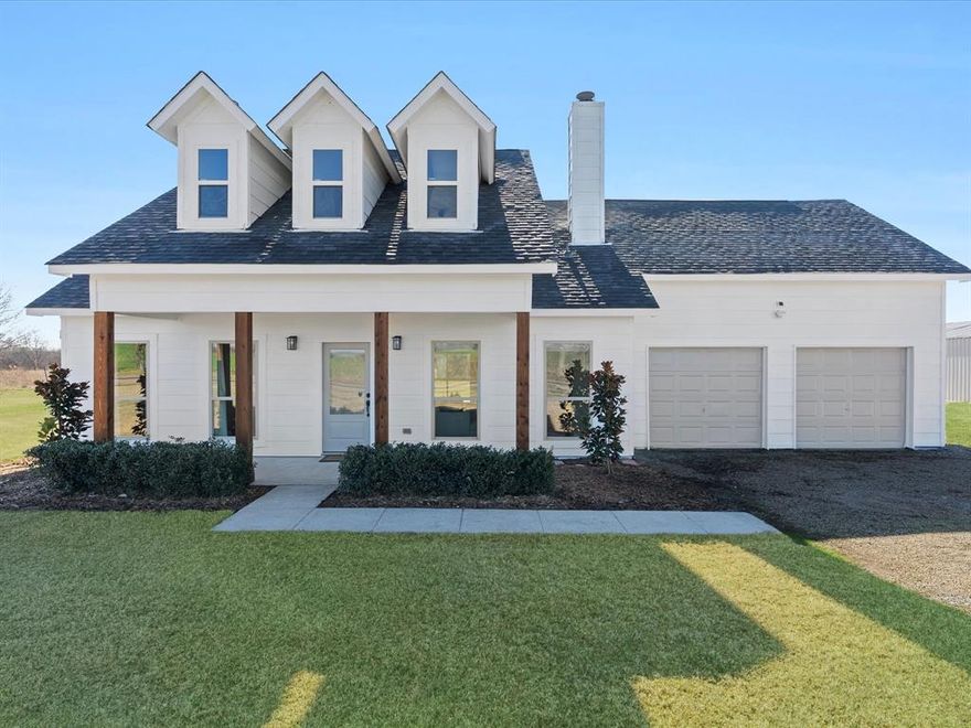 Discover the perfect blend of country charm and modern updates in this beautifully remodeled home set on 1.99 acres in Gunter, TX, located outside the city limits yet close enough to everything you need. This inviting 4-bedroom, 2-bath residence features fresh interior and exterior paint, new windows, and laminate flooring throughout, creating a bright, cohesive, low-maintenance living space. The second story offers a private full bedroom with a walk-in closet along with an oversized game room that provides the perfect retreat for entertainment, hobbies, or extra living space. The kitchen shines with brand-new appliances and abundant natural light, flowing seamlessly into comfortable living and dining areas ideal for family gatherings. Step outside to enjoy peaceful countryside views from the covered front porch or relax and entertain on the spacious covered patio. For hobbyists, business owners, or anyone needing serious space, the property includes a 60' x 30' shop complete with electricity and a half bath, perfect for projects, storage, or future expansion. Animal lovers will appreciate the 20' x 20' barn with three stalls, offering flexibility for livestock, horses, or additional storage. With nearly 2 acres to call your own, along with an optional 3.14-acre tract available for purchase, there is endless room for toys, adventures, and creating new family memories. This is the country lifestyle you have been dreaming of. Schedule your showing today!