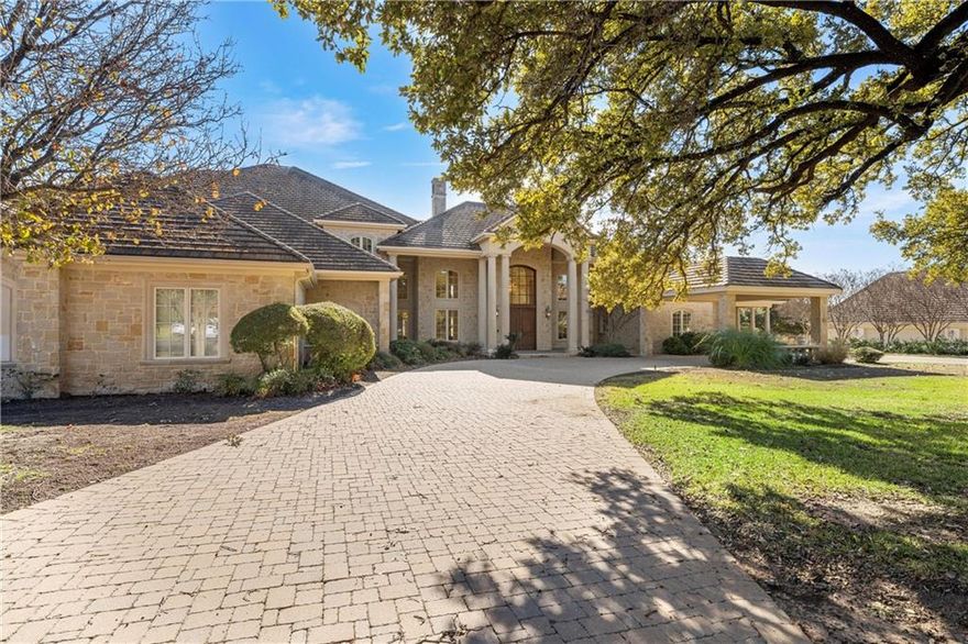Located within an exclusive gated community, this exquisite 8,237-square-foot estate offers unparalleled elegance and comfort. This home is just a short walk from the renowned Ridgewood Country Club, this residence features 4 spacious bedrooms, 4 full bathrooms, and 3 half bathrooms, making it the ideal sanctuary for family living and entertaining. The home showcases a meticulously designed floor plan with soaring two-story ceilings in the living areas, enhancing the sense of grandeur. Ample natural light fills every room, highlighting the elegant finishes and custom details, including beautiful built-ins, coffered ceiling, and gorgeous moldings. The chef’s kitchen is a culinary masterpiece, featuring a gas range, double ovens, and dual sinks. A walk-in pantry with built-in shelving offers exceptional storage, while ample cabinet and counter space provide both functionality and style. The kitchen is further complemented by a sleek, paneled dual refrigerator, blending seamlessly with the cabinetry. Additionally, a walk-in freezer ensures you're fully equipped for large-scale entertaining or everyday living. The isolated primary suite offers a private retreat and features dual walk-in closets, along with a spacious primary bathroom that includes a separate tub, separate walk-in shower, two toilets, and dual vanities—creating a luxurious spa-like experience at home. Additional highlights of this stunning home include a cedar closet for storing seasonal items and keepsakes, along with a large utility room that is equipped with a sink and abundant storage, ensuring that everyday chores are a breeze. With 4 gas log fireplaces thoughtfully placed throughout the home, warmth and sophistication are effortlessly blended, offering a perfect retreat in every season. An elevator provides easy access to the upper floors, where an upstairs balcony overlooks the lush, mature trees that surround the 0.95-acre lot. Step outside to the covered patio, where you can relax and enjoy the