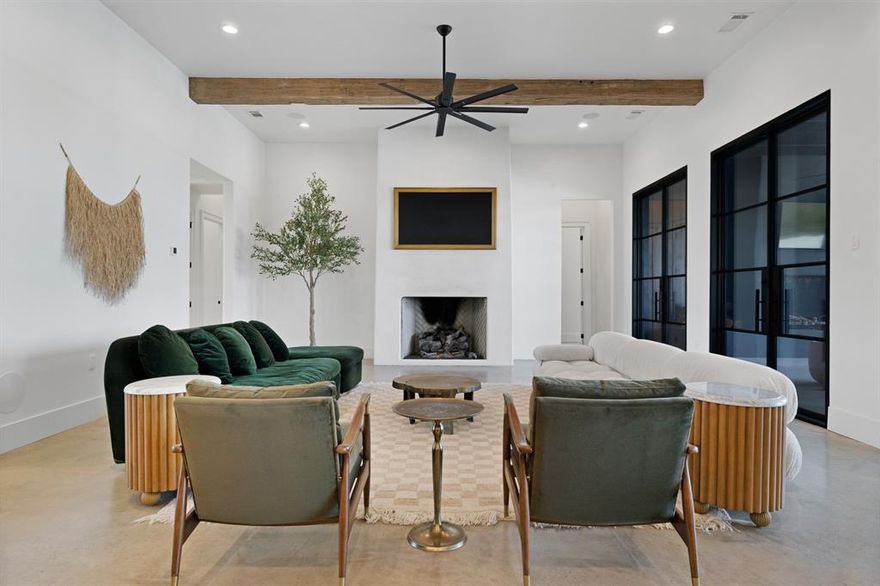 This exceptional Texas ranch for sale offers 69 cross-fenced acres and a luxury estate home of over 6,000 square feet, just 25 minutes from the city. Designed for buyers seeking Texas land, horse property, cattle land, recreational ranch acreage, or a private family compound, this one-of-a-kind property blends modern luxury with ranch functionality. The estate features 5 spacious bedrooms, 7 bathrooms, a private guest house, Control4 smart home technology, a chef’s kitchen, custom dry bar, wet bar, gas fireplace, dedicated office spaces, and expansive living and entertaining areas. The resort-style outdoor setting includes a heated pool and spa, putting green, outdoor kitchen, ponds, and panoramic Texas views. Property improvements include 4 wells, a generator, barn with attached pens, cross fencing for livestock or equestrian use, and room to build additional homes or structures. Ideal for buyers from Houston, Austin, San Antonio, Dallas-Fort Worth, California, Colorado, Montana, Wyoming, and New Mexico looking for luxury ranches, horse property, farm and ranch land, or legacy acreage in Texas.