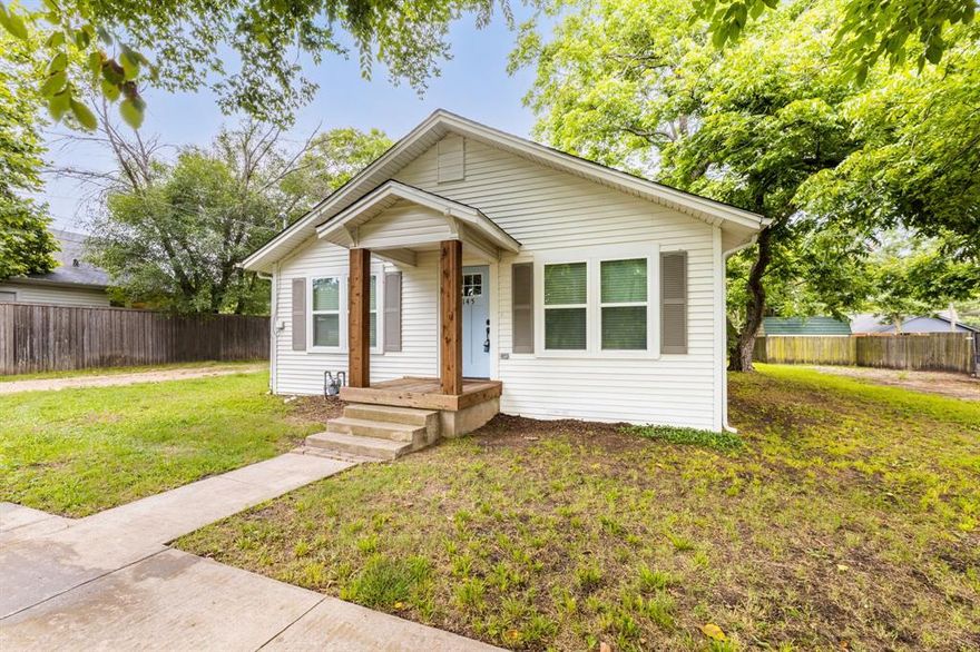 **MULTIPLE OFFERS RECEIVED** Please submit highest and best by Monday June 12th at noon!  Come fall in love with this charming renovated 1935 farmhouse!  This home boasts a light and bright open concept kitchen, living room, and dining room.  Along with 3 bedrooms and one exquisitely designed bathroom!  You'll enjoy beautiful LVP flooring, custom kitchen cabinets, a kitchen island, a gas stove, gorgeous granite counter tops, and a large pantry!  Off the kitchen there is a spacious laundry room.  All plumbing, electrical, HVAC, and windows were replaced in 2020.  Foundation repaired in 2020 and new roof in 2023.  Come enjoy downtown living at it's finest in one of the most desirable school districts in North Texas!