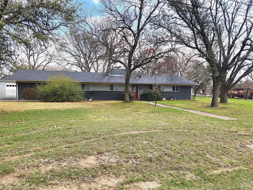 Rare find in town — 1.24 acres grandfathered for animals in highly sought-after Aledo ISD. This property offers excellent functionality with three separate fenced areas, a small tack room, and a loafing shed ideal for farm animals. A second 29x35 garage, with a 2 car rollup garage door, and separate entrance door, provides additional storage or workshop space.
The home features a large open living area with a classic brick wood-burning fireplace, plus 3 bedrooms and 1.5 baths ready for your personal updates. Conveniently located close to shopping, schools, and amenities, this property offers the perfect blend of space, flexibility, and in-town convenience.
Bring your animals and make this home your own.