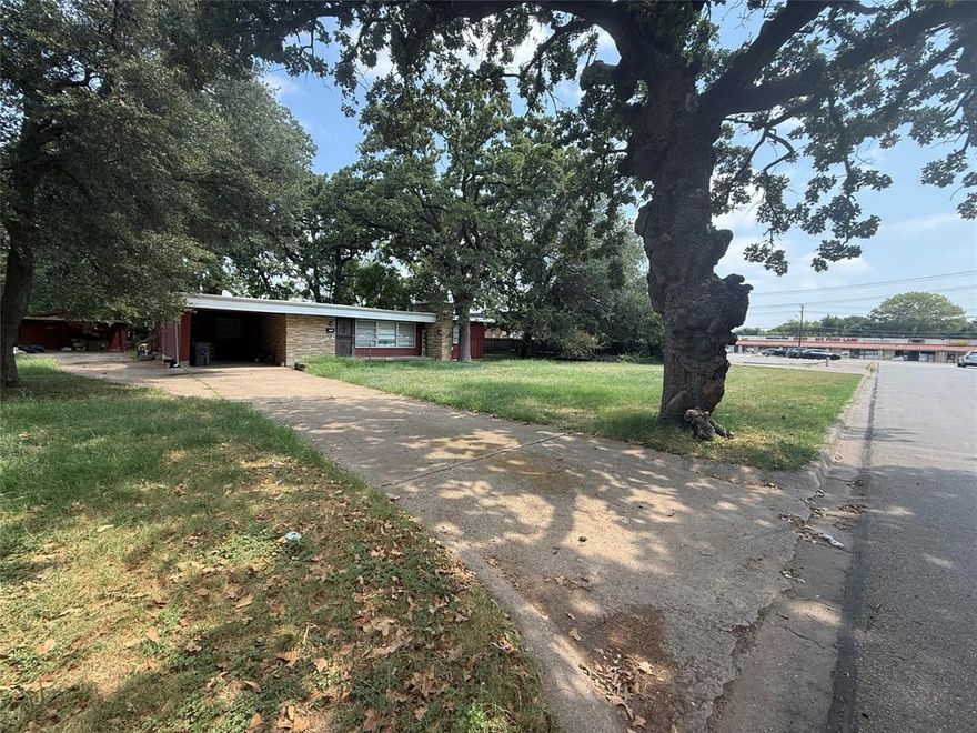 Rare find of 0.5 commercial acre that's 50 feet away from the busy Cooper Street in Arlington. Property is half an acre, zoned commercial, but city said could be switched to residential zoning. Property has a 1400 sq ft house on it currently, house is in decent shape, but the value is in the land. Could be subdividable, has an apartment building right across the street from it, so possible for multifamily opportunity here as well. Within walking distance to shopping, dinning etc. A gem for the savvy developer investor.  Half acre on Cooper sold for 600k+ years ago.
Stop by and see the possibilities.