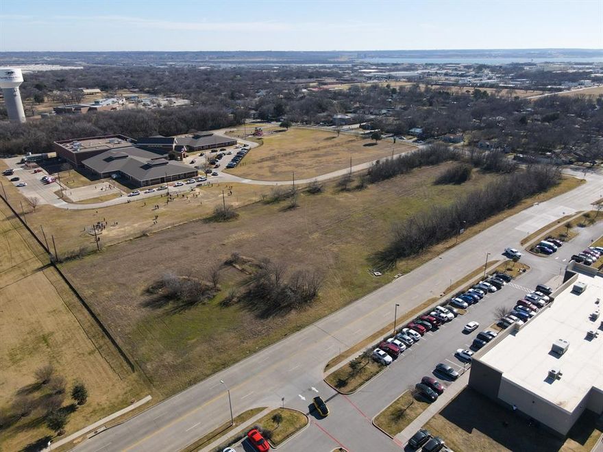 4.42 +- acres prime for retail, restaurants, multifamily or townhouse. Will require rezoning as it is currently in PD-41 which is light industrial zoning. Property sits directly across the road from TX DPS drivers license office and directly in front of Garcia Elementary School.