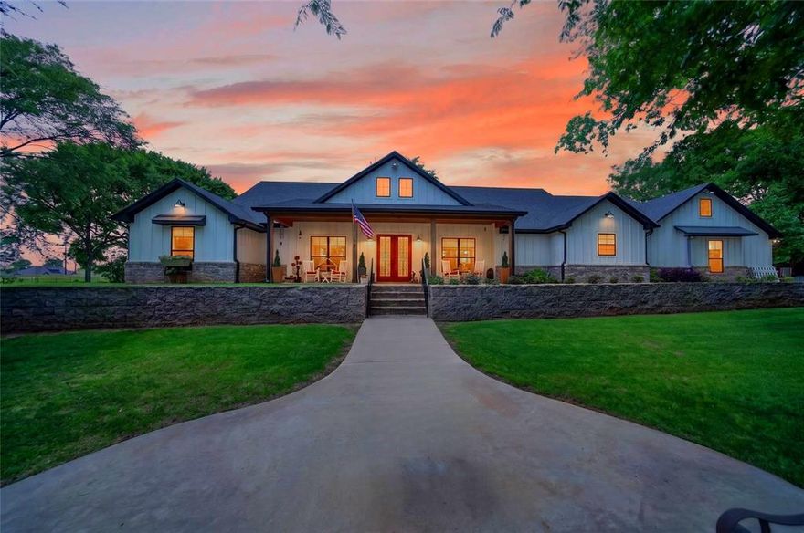 Welcome to your own private retreat at 805 CR 3802 in Bullard, TX, where manicured grounds, mature trees, and peaceful surroundings create a setting reminiscent of Central Park. Perched on a hilltop overlooking 3.1 beautifully maintained acres, this exceptional property offers privacy, charm, and functionality just minutes from downtown Bullard. Fully fenced with attractive hog wire and pipe fencing, the entrance is framed by elegant brick accent columns that make a lasting first impression.As you arrive, you'll immediately appreciate the inviting front porch and terraced fire pit area, the perfect place to relax and take in the scenic views. Inside, the home welcomes you with a spacious living room featuring soaring cathedral ceilings, striking wood beam accents, and an open, airy feel ideal for gathering and entertaining. The living area flows seamlessly into the well-appointed kitchen complete with a gas range, oversized island with abundant storage, generous breakfast room, and a walk-in pantry highlighted by a charming antique door. Designed for both beauty and practicality, this kitchen is truly the heart of the home. The split primary suite offers a peaceful retreat with oversized proportions, a large walk-in closet, and a thoughtfully designed ensuite bath featuring a freestanding soaking tub, oversized walk-in shower, and spa-like atmosphere. On the opposite side of the home, two guest bedrooms share a hall bath, while an additional bedroom enjoys its own private ensuite bath, offering flexibility for guests or multigenerational living. Outdoor living shines with the immense covered back patio featuring cathedral ceilings and automatic screens, creating an ideal space to play, grill, dine, and unwind nearly year-round. The oversized 2.5-car garage offers approximately 975 square feet with insulated doors, while spray foam insulation throughout the home helps maintain energy efficiency and moderate utility costs.Beautifully landscaped & private...Your HOME!