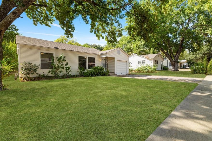 WELCOME HOME! CHARMING HOME LOCATED IN THE HEART OF DENTON! BEAUTIFUL UPDATES! This homes has lots of NATURAL LIGHT! UPDATES INCLUDE fresh paint, QUARTZ COUNTERTOPS in kitchen and bathroom. Kitchen is updated with new cabinets, stylish backsplash, white quartz countertops, NEW STAINLESS REFRIGERATOR, new stainless gas range w. stainless vent hood, new luxury vinyl plank wood floor.  Bathroom is updated with new white quartz countertop, oversized stylish shower tile, luxury vinyl plank floors.  ORIGINAL HARDWOOD FLOORS SANDED AND STAINED in living room, bedrooms and hall. Seller updated home to have CENTRAL AC and HEAT with new AC unit, ductwork, and vents throughout home-2023! AC UNIT INSTALLED 2023! Large, separate utility room w. new luxury vinyl plank wood floors. WASHER and DRYER are included with home!  New fence was installed in 2024. This home is perfect for a first time homebuyer OR an investor! This home is move-in ready. Conveniently located north of 380.  Minutes to the Denton Square, UNT, TWU!  Easy access to 35!  Minutes to Rayzor Ranch, new Denton High School, North Lakes Park w. new tennis and pickleball courts!