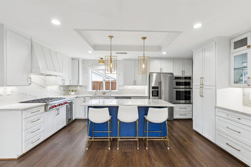 Come see this one of a kind Country Place gem! Entering into the great room with vaulted ceilings, beautiful built ins and large floor to ceiling windows overlooking the well landscaped patio. Dining room is perfect for formal entertaining or cozy family breakfast. Fully remodeled kitchen with quartz countertops, Viking range, large sink, island and goregous cabinets. Pennisula is perfect for wine bar or coffee station. Primary bedroom continues the pattern of floor to ceiling windows allowing beautiful natural light into the space.  En suite bathroom with jetted stub, large shower and his-hers vanities. Now, lets talk about the closet! 10x13 walk in closet with high ceilings and more space that you will find in any home of this age.  The space off the closet can be used as excersize room, office, dressing room, or more storage. What a bonus! Another rarity is the large second living room featuring electic fireplace for warmth without the hassel of wood! Perfect spot for watching movies and hanging out. Backyard covered patio and hot tub and still room for trampoline or play area has the making of backyard dreams.  Country Place Community features 9 hole golf course, tennis and pickleball courts, fishing ponds, playground and clubhouse. Community pool currently being rebuilt for scheduled reopening May 2026.  Ammenities only available to residents. Come quick. This won't last long!