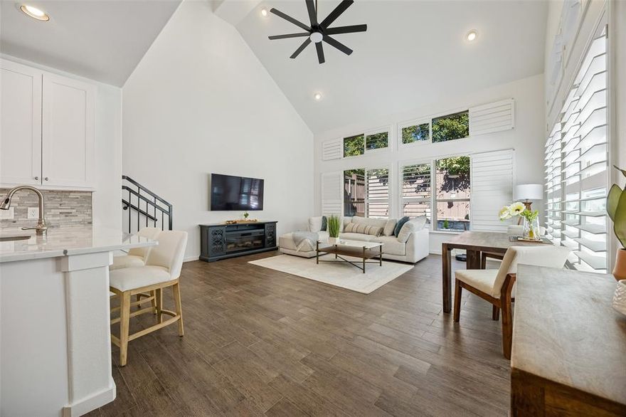 Located just minutes from Downtown Dallas, this exceptional lock-and-leave Garden Home offers incredible value with a low HOA and effortless living. Beautifully remodeled, the home welcomes you with soaring 20-foot ceilings and an abundance of energy-efficient windows that flood the living space with natural light. High-end plantation shutters provide both privacy and refined style. Porcelain tile flooring, custom-milled cabinetry, and a seamless open-concept layout create an elegant flow between the kitchen and living areas, ideal for everyday living and entertaining. The thoughtfully designed floor plan features a spacious bedroom, full bath, and laundry area on the first floor. Upstairs you will find the primary bedroom and a second full bath. A third room offers flexibility for a guest room, gym, or a home office. All three bedrooms boast generous closet space. Enjoy low-maintenance outdoor living in the private backyard, complete with a patio and turfed yard. Two designated parking spaces directly in front of the home ensure hassle-free parking. Community amenities include a sparkling pool just steps away, front yard maintenance, water service, clubhouse access, and a private dog park—all covered by the HOA. Ideally located near Stevens Park Golf Course, Bishop Arts District, Sprouts Farmers Market, Kessler Theater, and more, this home combines comfort, style, and unbeatable convenience.