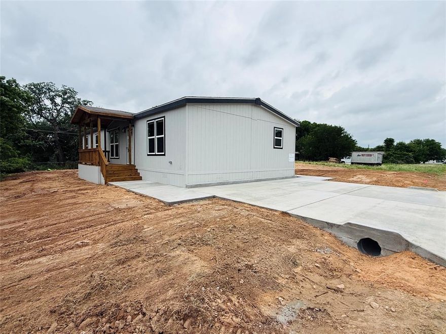 NEW CONSTRUCTION to be complete soon! Back yard privacy fence to be completed with other items. Adjacent 50x100' Cleared off lot available for purchase along with home as well for extra yard or RV Storage! 

This brand-new 4-bedroom, 2-bathroom home offers everything you need and more! Located in the sought-after Arrowhead Shores community, you’ll enjoy the perfect blend of modern living and convenience, all just down the road from the HOA swimming pool and park.

Home Features: Size: 1,474 SQ. FT. of living space. LED flushed-mounted ceiling lights throughout; Bathrooms: Both bathrooms feature fiberglass shower tub kits for comfort and style; Entertainment Center: Includes an entertainment center with an electric fireplace to create the perfect ambiance; Stylish Finishes: Brushed gold faucets and cabinet hardware, elongated toilets - hardwood cabinet doors for a premium touch; Kitchen: Stainless Steel appliances.