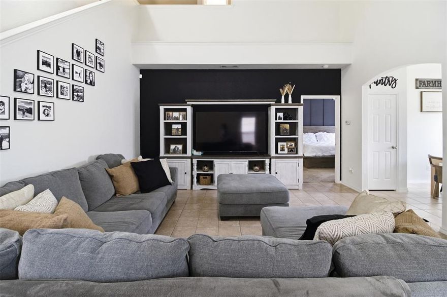 Welcome to this spacious two-story, 3-bedroom, 2.5-bath home at 4105 Tiburon Street in Fort Worth - perfectly positioned for convenient living and easy commuting. Step inside and enjoy a thoughtful floorplan featuring a first-floor primary suite with an en-suite bath and generous closet space, offering privacy and comfort without stairs. The main level flows from a welcoming living area into the dining space and kitchen - ideal for relaxed everyday living and entertaining. A convenient half bath on this level serves guests. Upstairs, two additional bedrooms and a full bathroom provide flexible living space for family, guests, or a home office. This home is well-situated for regional access. Loop 820 is just minutes away, providing a quick connection around Fort Worth and to major corridors such as I-35W (approximately 6-8 miles), making travel north toward Denton or south toward Hillsboro manageable. Downtown Fort Worth is roughly 10-12 miles away, putting urban dining, entertainment, and business centers within easy reach for weekday commutes or weekend plans. Everyday conveniences are close by too - grocery, retail, and dining options are just a short drive from your doorstep, and parks and community amenities abound in this established neighborhood. Whether you're looking for a comfortable space to call home or a smart investment opportunity, this property offers location, layout, and potential for personalization. Photos-grass has been greened to show the potential for the spring.