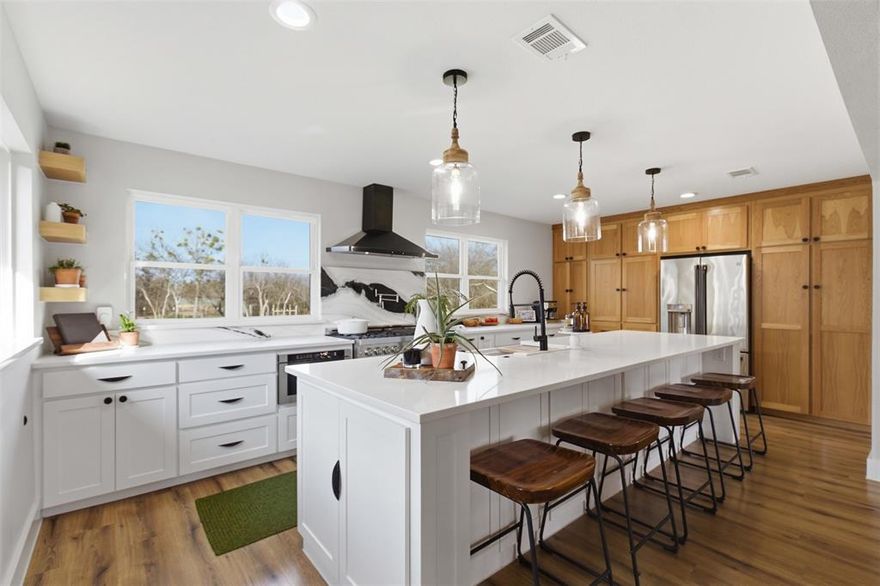 Completely remodeled and truly magazine-worthy, this stunning 3-bedroom, 2-bath home at 539 N. Stewart St. in Jacksboro is the perfect blend of modern design and timeless charm. Every detail has been thoughtfully updated from the beautiful finishes and designer lighting to the stylish kitchen and spa like bathrooms. The open concept layout offers a bright, inviting living space ideal for entertaining, while the fully updated kitchen features sleek countertops, custom cabinetry, upgraded appliances, and a show-stopping pass through window that opens directly to the back patio, perfect for serving guests and hosting gatherings with ease. The patio creates an incredible outdoor living space you’ll enjoy year round. The spacious primary suite provides a private retreat with a beautifully renovated en-suite bath. Outside, you’ll find an impressive 30x30 workshop with electricity, two roll-up doors, and ample space to accommodate an RV. Attached is an additional 400 sqft. lean-to for even more storage ideal for equipment, hobbies, or lawnmowers. Move-in ready, impeccably styled, and packed with function inside and out, this one is a rare find!