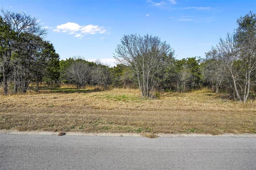 Have you ever vacationed in a luxury resort and wished you could live there full time? Here is your chance! All the amenities you could hope for--two swimming pools, tennis courts, 18 hole championship golf course, 24 hour security, clubhouse, restaurant, hiking trails, fishing ponds, playground, pro-shop--on over 3,000 acres nestled in the peaceful Hill Country. Close to the excitement of Dallas and less than an hour to the culture of Fort Worth so you will lack for nothing. Build your dream home with your own creative touches but without a deadline for completion.