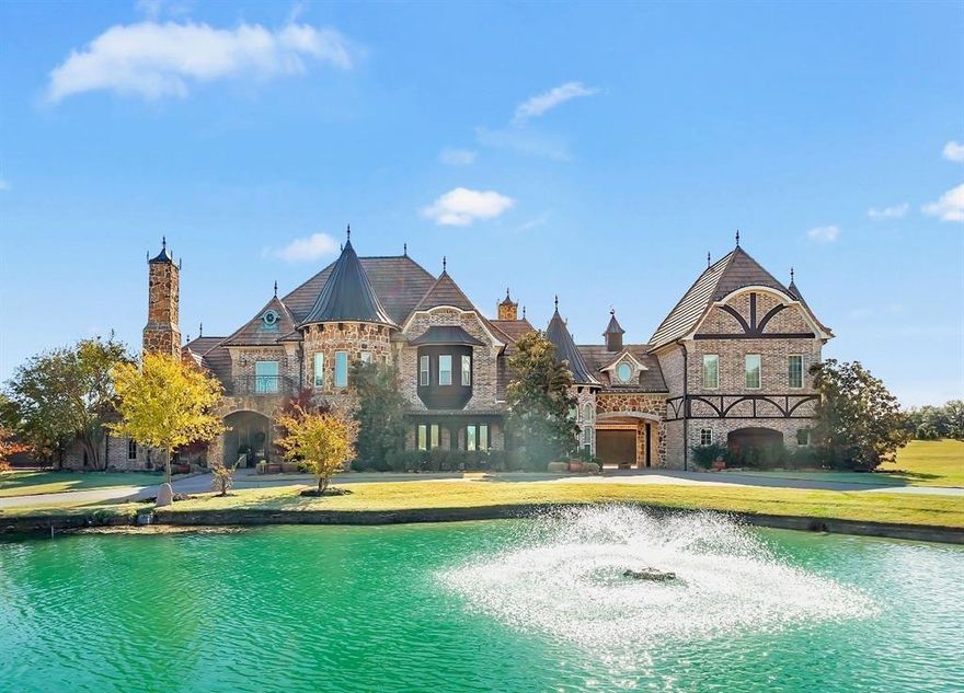 A rare opportunity to own this luxury estate that seamlessly blends elegance, comfort, and resort-level amenities; this extraordinary property in Prosper is truly one of a kind and located within highly sought-after Prosper ISD. Set behind a gated entrance on 2.9 private acres, this impressive 10,256 sqft.  estate offers exceptional privacy and refined living. A grand entrance welcomes you into a thoughtfully designed home featuring soaring ceilings, exquisite craftsmanship, and expansive living spaces ideal for both everyday living and elevated entertaining. This home features 6 bedrooms, 6 full bathrooms, and 3 half bathrooms, and is equipped with Thermador and Frigidaire professional-grade appliances, creating a chef’s dream kitchen. The home is wired for surround sound throughout and includes a state-of-the-art movie theater room for an immersive entertainment experience. A separate home gym and private outdoor basketball court adds a rare lifestyle amenity, further enhancing the estate’s appeal. The primary suite serves as a private retreat, complete with heated floors in the primary bathroom, an in-shower tanning machine, sauna and spa-inspired finishes designed for ultimate relaxation. Step outside to a true oasis backyard, featuring a resort-style pool with grotto and waterfall, perfect for hosting or unwinding in complete seclusion. The front of the property is highlighted by a pond with a fountain, adding to the estate’s serene setting and exceptional curb appeal. Additional features include a 6-car garage, storm shelter, expansive grounds, and unmatched privacy throughout. 
Don’t miss this exceptional opportunity to own a rare premier luxury estate in Prosper ISD.