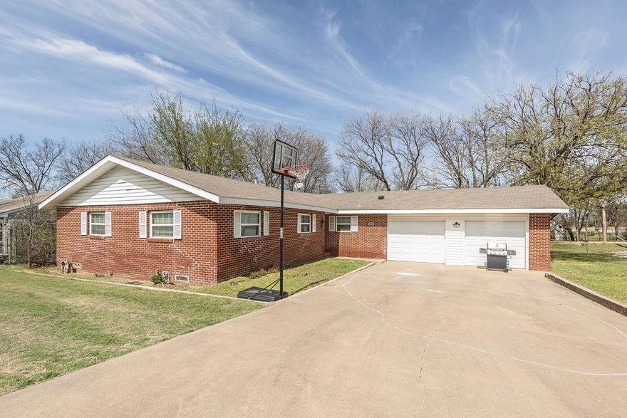 Investor Opportunity—Brick 4BR 2.5BA + Sunroom. Cash Only Investors, step forward—this solid brick home is ready for its next chapter. Featuring 4 bedrooms and 2.5 baths with a large open floorplan, this property offers the space and layout today’s buyers and renters love. Off the living room, a bright, spacious sunroom adds even more flexibility and is currently being used as a 5th bedroom—ideal for maximizing value. A two-car garage provides plenty of room for parking, storage, or a workshop setup. Conveniently located near local attractions, this is a prime chance to renovate, refresh, and unlock the upside. Cash buyers only.