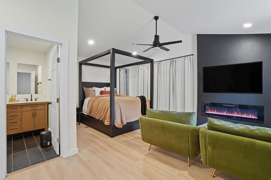 Welcome to this beautifully updated and expanded home in the highly desirable Arlington Heights community. Offering five true bedrooms (or four plus an office), three full bathrooms, two spacious living areas, and a formal dining room, this home combines charm, functionality, and room to grow. The kitchen is a standout with stainless steel appliances, abundant cabinetry, a walk-in pantry, study nook, and mudroom cubbies for everyday convenience. Upstairs features two generously sized bedrooms and a full bathroom, ideal for kids or guests, while the newly constructed owner’s suite impresses with vaulted ceilings, a large walk-in closet with built-ins, a spacious walk-in shower, and direct laundry access. Additional features include a cozy second living room with fireplace and built-ins, new interior paint, upgraded fixtures and ceiling fans, refreshed landscaping, a new upstairs water heater (installed December 2022), additionally the main floor water heater is newer (installed 2024) and two covered parking spaces. The refrigerator is included, making this home truly move-in ready.