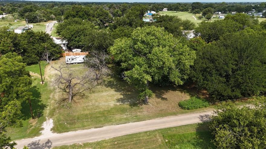 Welcome to Lots 12 & 13, a combined 0.40-acre slice of paradise near the beautiful Brazos River in the charming Horseshoe Bend community! This double lot is fully equipped with septic, water, and electricity, making it ready for your RV, weekend cabin, or future dream home. Surrounded by mature trees and complete with a small shed for storage, this peaceful setting offers both privacy and convenience.
Just minutes from the community boat ramp, you'll have easy access to the river for fishing, tubing, kayaking, and floating lazy summer days away. Horseshoe Bend is known for its laid-back vibe, outdoor recreation, and friendly, country-living charm.
An RV is currently on site and negotiable with the sale, giving you the option to start enjoying the property immediately!

Don't miss this opportunity to own a ready-to-go river retreat with all utilities in place—bring your plans, your boat, and your sense of adventure!