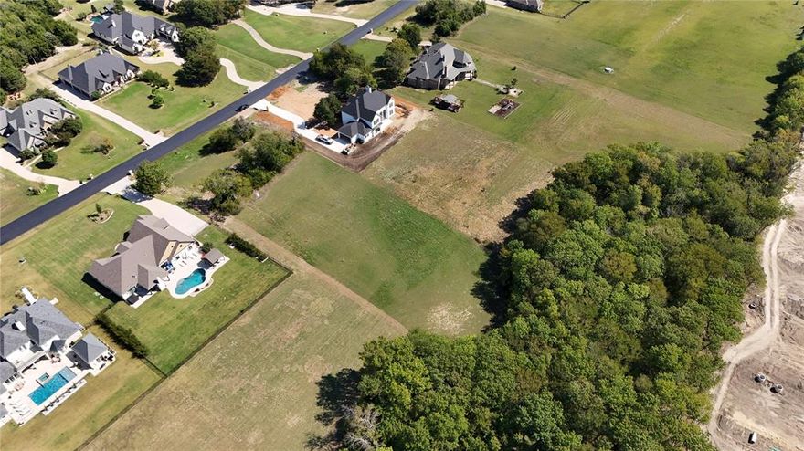 Exceptional Opportunity to Build in Highly Desirable Waterstone Estates! Build your custom dream home on this BREATHTAKING NORTH FACING 2.05 ACRE LOT , backing to a serene, tree-lined creek! Situated within the prestigious 680-acre gated community of Waterstone Estates, this exclusive enclave offers luxury country living at its finest—without city property taxes!
With no required timeline to build and the freedom to bring your own builder, you can create a home that perfectly suits your vision.
Waterstone Estates boasts exceptional amenities, including four scenic lakes, tranquil ponds, a private covered fishing pier, a lakeside park, a soccer field, a picnic pavilion, and a basketball court.
Enjoy the perfect balance of privacy and convenience—just under 10 miles from downtown McKinney, 9 miles from McKinney National Airport, 24 miles from Legacy West's premier dining and entertainment, and 27 miles from The Star in Frisco.