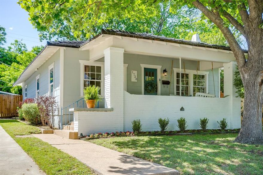 Rare opportunity to own a bungalow in the heart of highly sought-after Hi Mount. This charming 2 bedroom, 2 bath home is just steps from the iconic bricks of Camp Bowie, a short stroll to Winslow's Wine Cafe, and tucked behind local favorite Curly’s Frozen Custard, offering the ultimate walkable Fort Worth lifestyle.

Light filled interior showcases beautifully refinished hardwood floors, a decorative fireplace with built-ins, and original cylinder glass windows flanking the fireplace that add timeless historic character. The open kitchen and dining layout features new cabinetry, gas stove and dishwasher, creating an easy flow for everyday living and entertaining.

Major updates include new roof 2026 and new plumbing for added peace of mind. Updated bathrooms include a primary suite with walk in shower and double vanity. Additional highlights include ceiling fans throughout, a dedicated laundry room with washer and dryer, and HVAC in good working condition. All appliances convey.

Enjoy outdoor living with a spacious front porch complete with a large porch swing perfect for slow mornings and neighbors passing by, along with a large covered back patio ideal for entertaining. The backyard features a storage unit with its own covered porch, while separate covered parking is accessed by a newer driveway.