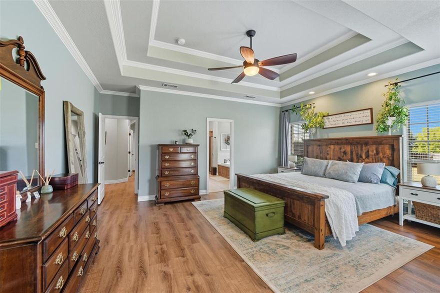 Welcome to your private retreat in one of Weatherford’s most peaceful subdivisions! Situated on over an acre of land, this desirable corner lot provides the perfect combination of privacy and space. A double gate offers easy access for your RV, boat, or trailer, making this home ideal for those who need extra storage. The roof is less than 3 years old, giving you added confidence and peace of mind. Inside, the spacious primary suite is a true retreat, featuring its own cozy sitting area, a warm fireplace, dual vanities, a relaxing garden tub, and a large walk-in closet. Upstairs, you’ll find a private living area with a full bedroom and bathroom—perfect for guests, extended family, or even a game or media room. Just minutes from downtown Weatherford, you’ll enjoy the convenience of nearby shopping, restaurants, and entertainment while still savoring the quiet comfort of country living. This property offers the perfect blend of lifestyle, location, and functionality