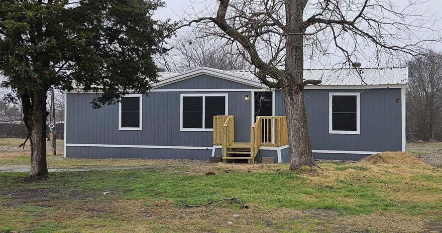 Recently remodeled, 1344 sf, 3-bedroom 2-bathroom doublewide manufactured home situated on a 0.7 acre lot that is located southeast of Ennis. Recent improvements consist of granite counters, new cabinets, kitchen island, tiled backsplash, and vinyl plank floors....NOTE:  The dwelling has been moved and is not eligible for FHA financing and recommend 21st Mortgage for financing.