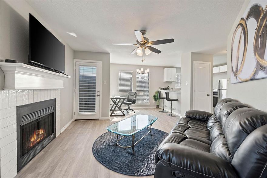 Furnished Condo with Modern Finishes in Arlington - Flexible Lease Terms! Beautifully updated and furnished 1-bedroom, 1-bath condo in prime Arlington location. Open layout and cozy fireplace. Kitchen features granite countertops, stainless steel appliances, and white cabinets. Bedroom offers ample closet space; bath includes walk-in shower and upgraded vanity. In-unit washer and dryer, fresh paint, luxury vinyl flooring, and modern lighting. Private covered patio plus easy access to highways, shopping, dining, and entertainment. Move-in ready! Also available for short-to-mid-term leasing (rates will vary).