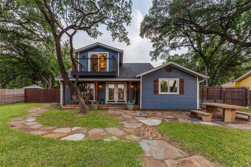 This inviting lakefront retreat on Lake Worth was designed with families in mind—where everyday life slows down and the best moments happen together. With over 3,300 square feet of bright, open living space, there’s room for everyone to spread out, gather up, and truly enjoy the lake lifestyle. Warm hardwoods, wood-look tile, and clean, timeless finishes create a home that feels both elevated and comfortable from the moment you walk in.
At the heart of the home, the kitchen is where everything comes together—morning pancakes before a day on the water, snacks for the kids, and big family dinners after sunset. An oversized island, farmhouse sink, custom cabinetry, and a walk-in “super pantry” make hosting effortless, while the dedicated coffee bar keeps mornings running smoothly. The primary suite offers parents a peaceful escape, complete with a private balcony overlooking the lake—perfect for quiet mornings or unwinding after a full day outside. A spacious custom dressing room and thoughtful details elevate the experience, while additional spaces like a home office, exercise room, and functional mudroom help keep busy family life organized. What truly sets this home apart is the flexibility for hosting family and friends. A fully separate guest suite—with its own living area, kitchen, bath, and three bedrooms—creates the perfect setup for grandparents, visitors, or even older kids wanting their own space. Step outside, and the lifestyle really comes to life. The backyard is built for memory-making, featuring a resort-style pool and spa, a large screened-in porch for game nights and dinners, and plenty of space to relax after a day in the sun. Down at the water, a private dock with 2 lifts and 2 levels, multiple decks, makes boating, swimming, and sunset watching part of your everyday routine. Whether it’s summer weekends, holiday gatherings, or spontaneous midweek escapes, this is the kind of lake house where traditions are made and memories last for generations.