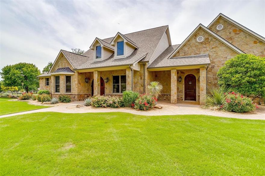 RARE OPPORTUNITY 4 miles from downtown Weatherford on 19 ACRES! LUXURIOUS custom home, large pool, outdoor kitchen entertaining area with fireplace and separate entry quarters! Stunning barn with second water well, 8 stalls, wash rack, 2  RV covered hook ups , equipment parking, workshop ,barn apartment, TANK, tack and feed rooms. Barn opens to the 150 x 275 ft roping arena with automatic roping chute, holding pens and alley! Property has front and back gated entrances for trailers and 3rd gated entrance for the home. Large magnificent oak trees and 5 well cultivated pastures are fenced and cross fenced with pipe and non climb wire with a 4 stall shed barn.The home boasts interior rock details,2 fire places, separate entry quarters, game room with built in shuffleboard table, bar with ice maker and frig. and half bath! The kitchen is a chefs dream with viking gas cooktop, 2 ovens, 2 dishwashers ,sub-zero, wine frig. and walk-in pantry! Master suite with fireplace, double walk-in shower, soaker tub, 2 vanities and a large walk-in closet with lighted dressing area! This home has just had all concrete floors refinished and new updated interior paint!