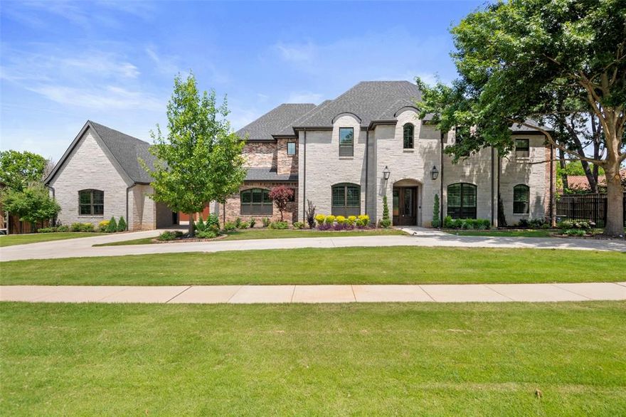 Builder’s Private Custom Home.  Let the Builder customize this home for you! Built with meticulous attention to detail by the original builder for personal use, this one-of-a-kind home combines elegance, function, and quality craftsmanship throughout. Rich hardwood floors and custom cabinetry span the entire home, with a thoughtful emphasis on storage at every turn. The heart of the home features a spacious open floor plan anchored by a stunning two-island kitchen, equipped with quartzite countertops, high-end appliances, and a 60 inch Wolf gas cooktop with double ovens. This chef’s kitchen seamlessly connects the great room and a spacious informal dining niche, creating the perfect flow for everyday living and entertaining. A dedicated executive office offers a private and professional work-from-home space. The laundry room is exceptional, boasting an additional panel-covered Sub-Zero refrigerator freezer, farmhouse sink, and a built-in dog crate for your four-legged family members.  The first-floor primary retreat is complete with a spa inspired bathroom featuring dolomite vanities, a zero-entry shower, and a large custom closet. Two additional guest rooms are located on the main level, one with a zero-entry shower ideal for multi-generational living. Upstairs, a spacious fitness room with an ensuite bath could easily function as a second primary suite. Two more bedrooms are found on this level, including one currently used as a craft room with an extra storage closet in the ensuite. A media room with an adjacent storage room is ideal for AV equipment or hobby space. Outside, the backyard offers just the right amount of privacy and relaxation without high maintenance.  Featuring a modern barn with 3 rolling doors perfectly suited as a car enthusiast's dream workshop complementing the home's 4 car garage.  Conveniently located to DFW airport, shopping and dining. Award winning Grapevine-Colleyville ISD