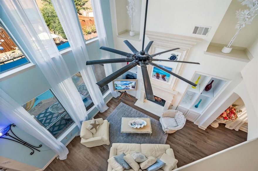 Welcome to this beautifully maintained 3-bedroom, 3-bath home nestled inside the private, gated community of Silverwood. Thoughtfully updated with a new roof, fresh interior paint, new carpet, new appliances, and smart home lighting throughout, this home is truly move-in ready. Upon entry, you’re greeted by a versatile flex space perfect for a home office or optional fourth bedroom. The elegant formal dining room showcases arched entryways and decorative smart recessed lighting, flowing seamlessly into the spacious living room. Floor-to-ceiling windows flood the space with natural light and frame picturesque views of the sparkling pool beyond. The chef-inspired kitchen is both functional and impressive, featuring a built-in industrial-size Electrolux Icon Series refrigerator, high-end new appliances, a generous quartz island with gas cooktop, glass-front cabinetry with customizable lighting, a wine fridge, and convenient pull-out drawers for effortless organization. Upstairs, the expansive primary suite offers room for a private sitting area and connects to a spa-like ensuite bath complete with a luxurious jetted tub, separate glass shower, dual sinks, and elegant glass accents. Step outside to your own private retreat. The backyard oasis features a cabana-style covered pergola, a secondary built-in covered entertaining area, and a recently resurfaced custom pool with cathedral steps, built-in seating, swim-up bar and table, plus an outdoor shower. Designed for both entertaining and relaxation, this outdoor space is truly exceptional. Offering the perfect balance of luxury upgrades and resort-style living, this Silverwood gem is one you don’t want to miss.