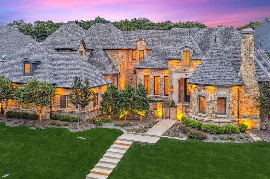 Located in Clariden Ranch on nearly three quarters of an acre, this stunning, fully renovated estate nestled on a quiet cul-de-sac in Southlake has approximately $1 million in thoughtful, high-end upgrades blending timeless elegance with modern convenience and exceptional craftsmanship. Step inside to all-new wide plank hardwood flooring, freshly textured walls, and a completely repainted interior. The kitchen is a culinary masterpiece featuring a True Residential fridge, Viking Tuscany dual-fuel range with double ovens, Miele and Bosch dishwashers, and a Scotsman nugget ice maker. Adjacent is a new wine bar and coffee station with two Sub-Zero refrigerators and a built-in Miele coffee system. Every bathroom has been remodeled, including a luxurious primary bath with a Kohler hydrotherapy spa tub. The laundry room features floor-to-ceiling vintage tile, a Kohler cast iron sink, and LG appliances. All new quartz countertops are found throughout, with Taj Mahal quartzite featured in the office along with a custom fireplace. Enjoy your own private theater with a Sony 4K projector, Marantz Dolby Atmos system, Klipsch speakers, and heated massage seating—all included. The smart home system offers voice-activated lighting, thermostats and security. Outside, the brand-new custom heated pool & infinity spa offer LED lighting, spa fountains, marble coping, and a Hayward automation system. Entertain in style with a new outdoor kitchen featuring a Lynx grill, stainless cabinetry, and granite countertops. Over 40 new windows, mahogany French doors & extensive landscaping complete the transformation. Additional features include 3 new high-SEER HVAC systems, epoxied garage with custom storage, and a fitness studio with iFit treadmill and Lululemon Mirror. Home offers school options to Northwest ISD Schools or Southlake Carroll Open Enrollment. Additionally, The Clariden School, a private International Baccalaureate School is located within the neighborhood.