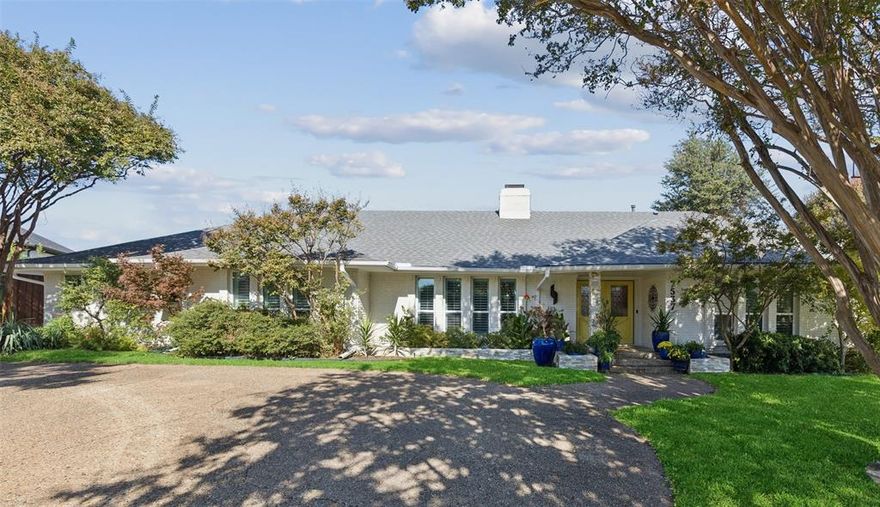 Stunning mid-century modern sanctuary thoughtfully updated with exceptional craftsmanship throughout. Nestled on a quiet cul-de-sac in desirable Royal Park Estates, this rare find backs directly to the Northaven Trail, offering seamless access to nature and outdoor recreation. Inside, the home provides expansive formal spaces ideal for gatherings and everyday living. The main living room is truly impressive - anchored by a refined fireplace and framed by floor-to-ceiling sliding doors that open to the serene pool area, blurring the line between indoors and out. The adjacent kitchen and casual living area are an entertainer’s dream, featuring a generous quartz island, wine bar, recent stainless steel appliances, custom tile backsplash, and designer lighting that elevates the space with modern elegance. The primary suite is a peaceful retreat, highlighted by a spa-inspired bath overlooking the zen-like backyard. Luxurious details abound, including a massive walk-in shower, deep soaking tub, beautifully curated tile selections, and an expansive vanity space. Secondary bedrooms are generously sized and share a stunningly remodeled bath finished with the same level of thoughtful design. A fourth bedroom is privately situated on the opposite side of the home - perfect for guests, multigenerational living, or a live-in nanny. Outside, discover an unbelievable saltwater pool large enough for laps, surrounded by a beautifully designed outdoor living and kitchen area - ideal for hosting and relaxing. No detail has been overlooked: epoxy-coated garage floors, fresh landscaping, irrigation system, custom closets, fresh paint, radiant barrier, and more. All of this in the heart of Dallas with effortless access to both 75-Central and the Dallas North Tollway. A truly exceptional home where style, comfort, and function meet in perfect harmony.