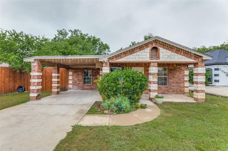 This beautifully updated home truly stands out on the block! Set on a spacious quarter-acre lot, the huge backyard is perfect for family fun and entertaining friends. The striking brick and stone elevation adds impressive curb appeal. Step inside to a solid, freshly painted interior featuring stylish laminate flooring throughout—no carpet here! The kitchen has been thoughtfully updated with modern appliances and finishes, ideal for any home chef. The living and dining areas offer comfortable, well-sized spaces for relaxing and gathering. Enjoy the privacy of a split-bedroom layout, with all rooms generously sized to accommodate your needs. Both bathrooms shine with floor-to-ceiling ceramic tile, sleek light and plumbing fixtures, and water-saving commodes. Landlord spared no expense in upgrades—this home is move-in ready!