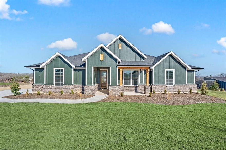 This is a great family home with 4 bedrooms, 2 full baths, 2 car garage. Wide open floor plan with great room, dining and kitchen that overlooks the massive back yard. Real hardwood floors throughout living, kitchen and dining area. Great brand-new floor plan that is getting rave reviews. The community Rocky Top Ranch is a new community in Reno, Texas offering luxury and peaceful serenity. Enjoy a small-town atmosphere and wide-open space. Rocky Top offers large 1+ acre lots. This scenic community features beautiful hilltop views and stunning sunsets. With convenient access to Eagle Mountain Lake, Springtown, Azle, Lake Worth, and Boyd, you’ll experience Reno’s rural charm while having city amenities nearby.