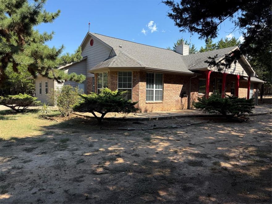 Stunning property in Mill Creek! This property includes a 3 bed, 2.5 bath main home, a 2 bed, 1 bath guest home, a two story storage building with a full bathroom, and a large workshop! Recently updated, the main home features an amazing kitchen with upgraded cabinetry, quartz counters, Thor gas cooking, stainless appliances, modern lighting, a walk in pantry, and a huge island! The breakfast area includes a large custom table and built in seating. The kitchen and breakfast rooms are open to the oversized living space, which has lots of space for seating and a large stone fireplace. The primary suite is king sized and has two closets, a large bath with dual vanities, a soaking tub, and separate shower. The secondary bedrooms are split with one being ensuite. The laundry room is updated with custom cabinetry and counters. The guest house has a full living and kitchen with plenty of cabinets, electric range and microwave, and refrigerator. The guest home also has two bedrooms, one bathroom, and a large, fenced backyard! The property also includes a two story storage building that has air conditioning and a bathroom. The workshop includes a covered parking area. The property backs to the US Corp property and Lake Texoma! There is an above ground pool behind the main home and just needs the liner and equipment reconnected. The seller has a new liner that will convey with the home. There are countless trees, room for play, and tons of privacy. This home is a must see!