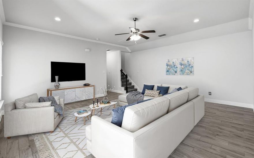 THIS HOME IS VERY low-maintenance, zero-lot-line FULL sized home offering complete privacy and a small patio backyard area NO GRASS TO MOW but it will grow back in if you want it and the flagstone is AMAZING!!   4 BEDROOMS, 3 FULL bathrooms, 3 LIVING AREAS.  A DOWNSTAIRS GUEST bedroom and FULL BATH. Fresh gray and white interior paint, tiled flooring and brand-new carpeting & 2 inch blinds makes this home BETTER THAN NEW!!  OPEN concept living area is ideal for entertaining and everyday living.  A home office which can double as a formal dining room.  The primary suite is located downstairs at the rear of the home, offering a quiet retreat away from street noise and exterior lighting.  Upstairs, you’ll find two generously sized bedrooms and a LARGE GAMEROOM perfect for family or guests.  Open kitchen features granite countertops, eating island, ample cabinetry, pantry, and a gas cooktop—perfect for cooking and gathering. Step outside to the private back patio with natural gas outlet for a grill.  Stonework provides easy upkeep with the option to allow grass to grow for pets or play.  Additional highlights include a rear entry garage for additional privacy with seller installed extra large overhead shelving and a work area for a bench and storage.  BETTER THAN NEW ULTRA clean. Top-rated Argyle ISD schools. New Tom Thumb opening in March with all the additional restaurants and shops,  Tankless on demand gas hot water heater.  This home combines comfort at a GREAT Size, style, and an exceptional community lifestyle—Find out WHY Harvest is a MCSAM AWARD WINNING COMMUNITY every year since 2012!  HARVEST is a totally unique, highly sought-after Agri-Hood designed for a healthy and connected lifestyle with community garden, sports facilities, Harvest restaurant and gift shop, Multiple pools for residents only, Dog Parks, Walking Trails, Fitness Centers and countless neighborhood amenities and events that make Harvest truly special.   HOA pays for Frontier Internet!