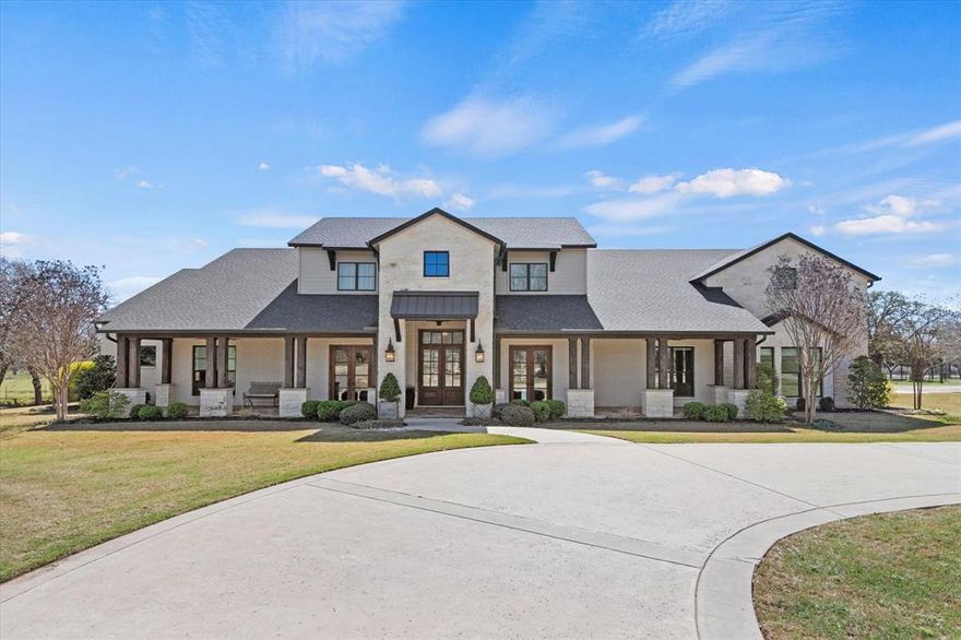 Experience the perfect blend of luxury, privacy, and ranch living on this breathtaking 68.88-acre estate in the heart of North Texas Horse Country. Naturally protected by scenic Pecan Creek, the property features rolling pastures, mature trees, and wide-open Texas skies—creating a peaceful retreat that feels worlds away while remaining just minutes from the North Dallas Tollway.

At the heart of the property sits an impressive custom-built ranch-style home offering over 5,000 square feet of thoughtfully designed living space. With 4 spacious bedrooms and 5 baths, the home showcases exceptional craftsmanship and an open-concept layout ideal for everyday living and entertaining.

The gourmet kitchen, complete with premium appliances and generous workspace, flows seamlessly into the expansive living area, anchored by a dramatic floor-to-ceiling stone fireplace. A wall of windows fills the space with natural light while framing breathtaking views of the pastures.
Designed for outdoor enjoyment, the breakfast room and main living areas open to a covered patio with a fully equipped outdoor kitchen and grill and a relaxing fire pit area—perfect for gatherings or quiet evenings under the Texas sky.
The ranch also offers functional amenities, including a cattle barn and ranch manager’s quarters, ideal for equestrian pursuits, livestock, or a fully operational ranch.
Whether you seek a luxury country estate, equestrian property, or a legacy ranch, this property offers the rare combination of privacy, comfort, and accessibility in one of North Texas’s most sought-after rural communities. Buyer and Buyers agent should independently verify the information provided.  This ensures accuracy and reliability in all transactions.
