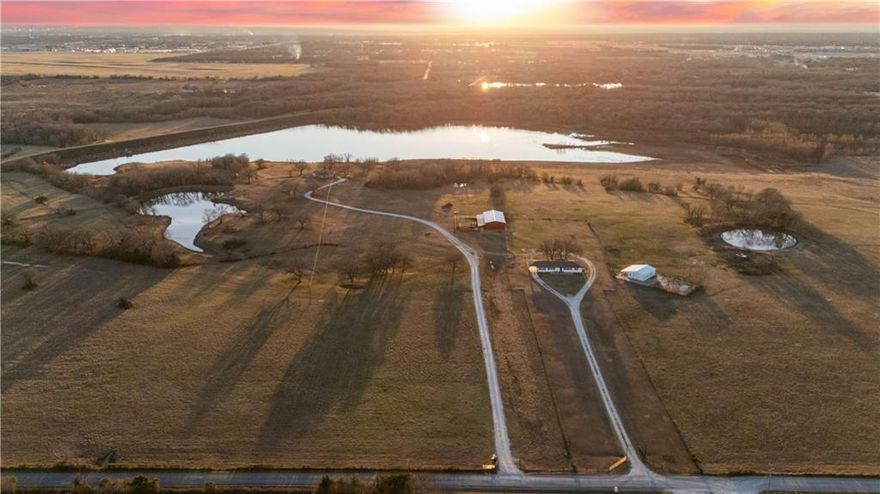 A Stunning Texas Ranch with Water, Wildlife, and Endless Possibilities

This incredible Texas ranch has everything—rolling land, a huge water reservoir, and plenty of wildlife. Whether you want a peaceful getaway, a top-notch hunting spot, a working ranch, or an investment opportunity or legacy ranch, this property is ready for you.

The land stretches across open fields with plenty of shade from trees, making it a beautiful place to explore. At the center of it all is a water reservoir estimated to be around 45 acres, full of bass, crappie, and other fish—perfect for fishing and enjoying nature. The Little Tehuacana Creek runs through the property, feeding the reservoir and adding to the scenic beauty. A second stocked pond attracts deer, dove, ducks, and geese, making this a prime spot for hunting. For the past 15 to 20 years, this property has been known for some of the best duck hunting in the region. Scattered throughout the land, you’ll find native wild berries, adding a touch of charm and a taste of the land’s natural beauty.

The main home was completely renovated in 2022, blending modern comforts with country charm. Updates include new windows, HVAC, hot water heater, insulation, paint, and septic system—giving you peace of mind for years to come. Need extra space? The guest house by the water’s edge has a spacious deck where you can unwind, enjoy the views, or host visitors.

This ranch is also fully set up for livestock, with strong fencing, cross-fencing, and working cattle pens attached to the barn. Everything is built for easy care and management.

With stunning scenery, top-tier hunting, well-planned infrastructure, and endless potential, this ranch is a rare Texas treasure. Don’t miss your chance to own this one-of-a-kind investment or legacy property!