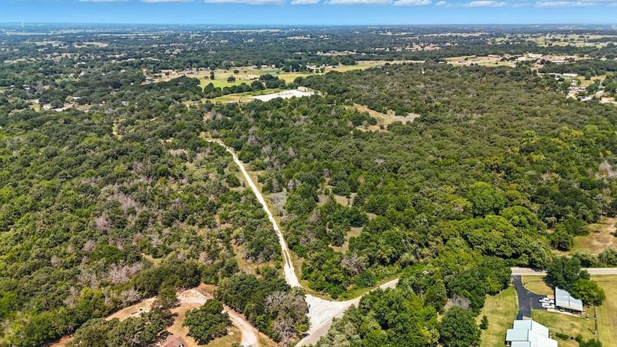 Discover 78 acres of opportunity in the heart of Azle, Texas. This expansive property offers endless potential—whether you’re looking to build your dream ranch, create a private retreat, or explore residential development. With a prime location just minutes from Eagle Mountain Lake and within easy reach of Fort Worth, this land blends country living with city convenience. The terrain features scattered mature trees, and plenty of space for livestock, recreation, or future building sites. Road access makes it simple to bring your vision to life, and the acreage provides privacy while still being close to schools, shopping, and major highways.

Properties of this size and location are rare—don’t miss the chance to own a piece of Azle’s growing community.
