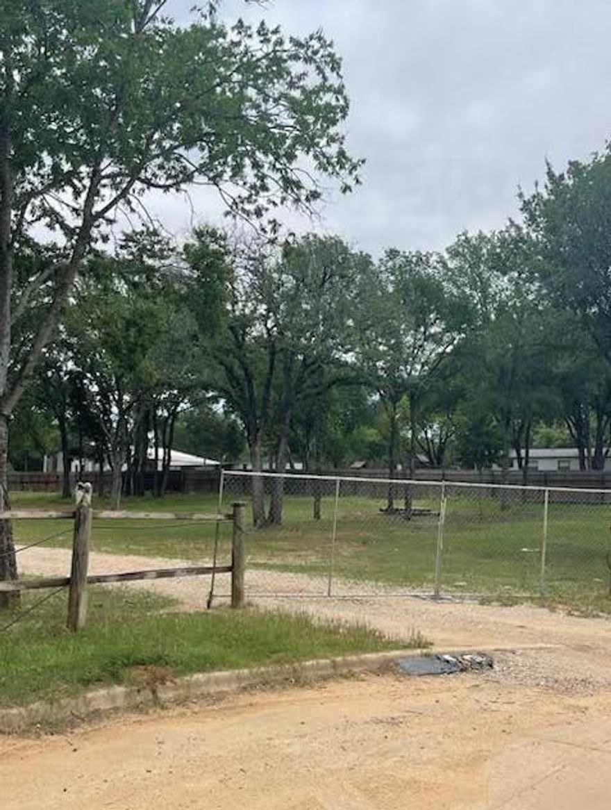 Discover the perfect canvas for your dream home or investment vision with this expansive 1.2-acre lot in the heart of Mansfield, Texas! Tucked within city limits, this rare gem offers the ideal blend of space, privacy, and convenience. Whether you're looking to build a custom estate, develop a multi-use property, or simply invest in prime real estate, this lot delivers endless possibilities — all within minutes of top-rated schools, shopping, dining, and major highways. Enjoy the freedom of wide-open space without sacrificing urban access! Mature trees dot the landscape, offering a peaceful, park-like setting, while city utilities are readily available to simplify your build. With Mansfield’s continued growth and charm, this is more than just land — it’s an opportunity to create something truly special. Don’t miss your chance to own a slice of Mansfield’s future!