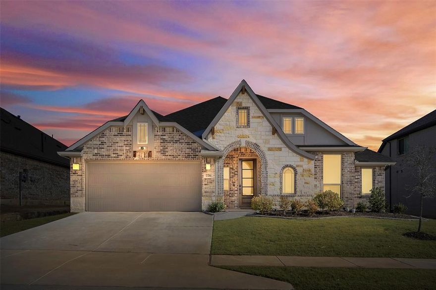 Bloomfield Homes custom build offering 4 bedrooms with the 4th bedroom having french doors that give it the ability to be used as an office! The exterior showcases beautiful stone and brick contrast with a stone-lined flower bed for added curb appeal. Inside, enjoy upgraded wood flooring, a floor-to-ceiling stone fireplace, two dining areas, and a deluxe kitchen with stainless steel appliances. Step out back to relax or entertain under the extended covered patio.