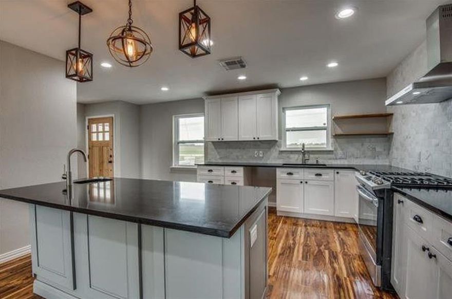 Amber sunsets, fresh air and a night sky full of stars is what you get w this home that sits on 1 full acre. Home is located in desirable Princeton ISD just up the street from new high school. It has been completely remodeled! Inside you will find your dream kitchen designed for family gatherings. The kitchen has quartz counter tops, GAS RANGE, Island w 2nd wash station, marble back splash, and many custom cabinet additions like a lazy suzy and spice rack built in! Beautiful wood laminate throughout the entire home. Both bathrooms have porcelain tiles, quartz counter tops. Tankless water heater. Your master bath has a spa like STAND ALONE SOAKER TUB and glass shower.