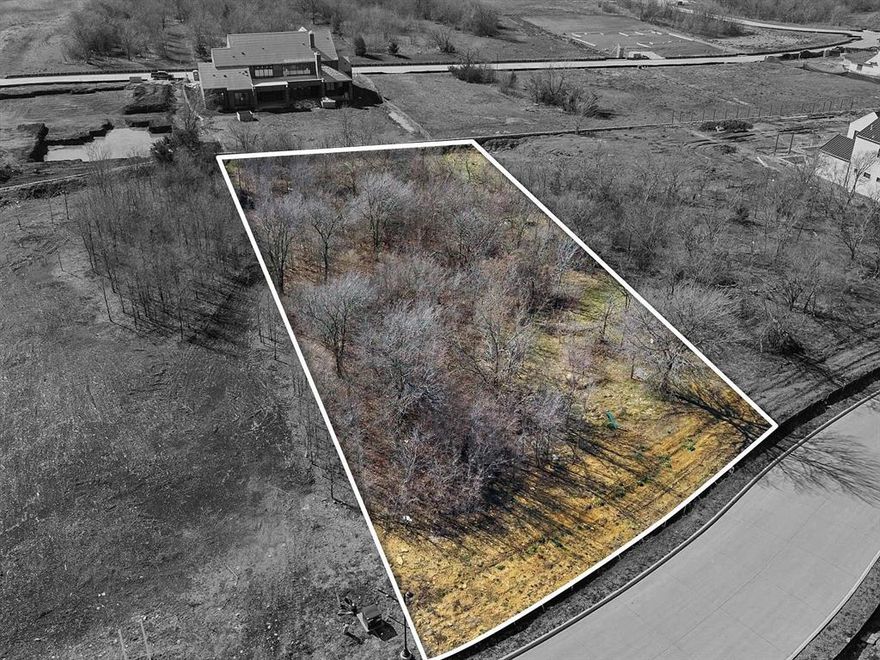 This property resides in the Hills of Kingwood, a premium neighborhood in Frisco. **BUILD A HOUSE WITH YOUR OWN CHOICE OF BUILDER - THE LOT IS NOT OWNED BY A BUILDER! This land is located in a prestigious gated community at the heart of the city with a great north-facing orientation, making it the perfect location for one's dream home to be built upon. Mature trees cover the front and back end of the lot. The trees around the lot have been recently trimmed and have allowed those who want to visit be able to see a much better picture of the lot itself.