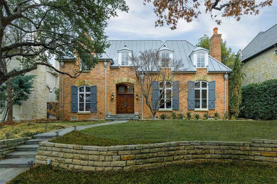 Designed by noted architect Stephen Chambers, and located in the heart of Highland Park, this very high quality home in an A+ location features an open floor plan, ample natural lighting, and custom features including elevator, lit pier & beam crawl space and geothermal hvac. Downstairs includes a paneled study with closet & full bath, which could be a downstairs bedroom suite, stunning great room with vaulted ceilings open to a spacious dining room, 2nd living area open to the kitchen with floor to ceiling windows on the rear façade of the home & wet bar with wine fridge. Upstairs are 3 spacious bedrooms, including the primary suite with sitting area, coffee bar & balcony, plus an oversized bath with 2 closets, 2 vanities & separate tub & shower, and two addtl bedroom suites. The back stairs lead to a guest suite with living & sleeping, walk in closet and full bath, that also makes a wonderful office or game room. 3rd floor could easily be finished out to a 5th bedroom suite or media.