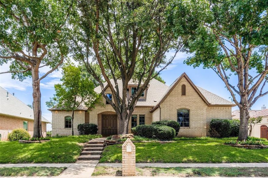 Prestonwood Hills Golf Course Property! Beautiful Custom Home on an interior golf course lot nestled on the number sixteen putting green! Built with extensive wood cabinetry, shelves & drawers in kitchen, built ins, custom millwork, solid core doors, and tons of storage! This home is built with timeless sophistication with a floorplan that offers an elegant primary suite downstairs plus a guest room with full bath.  The minute you enter the double door entry way with soaring ceilings and elegant staircase you will be in love! Put your decorative touches on this ready to move in Home! A split 3 Car garage with ample space, built in Electrolux vacuum system, gorgeous wood cabinets and trim, double oven, built-in gas cooktop, vented out. Upstairs there are two rooms with a jack and jill bath set up, two split sinks & a tub shower. Just outside is a sitting room or Study with plush carpet and walk in storage in the attic.