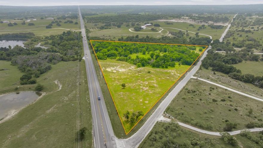 Fantastic and unrestricted 14 acres!! Check this one out! Located just north of Stephenville on US Hwy 281 at the corner of Hwy 281 and CR164! This property offers so many opportunities and potential uses! The visibility and traffic count is second to none! This could be an excellent commercial lot or a great spot for a new home! This type of opportunity to purchase unrestricted acreage is getting fewer and farther in between! So if you are looking for something like this, come take a look and see if its the one for you! The boundary lines in the photos are estimates! Please refer to the survey in the transaction desk for the exact boundaries!