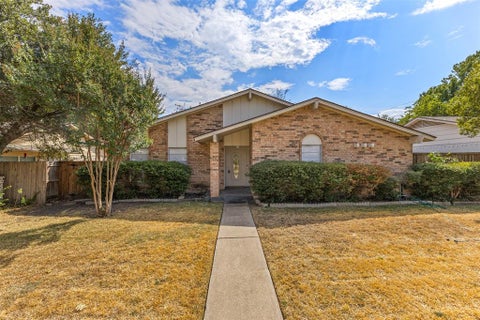 Photo of 2418 Village Green Drive, Garland, TX 75044 (MLS # 21402689)