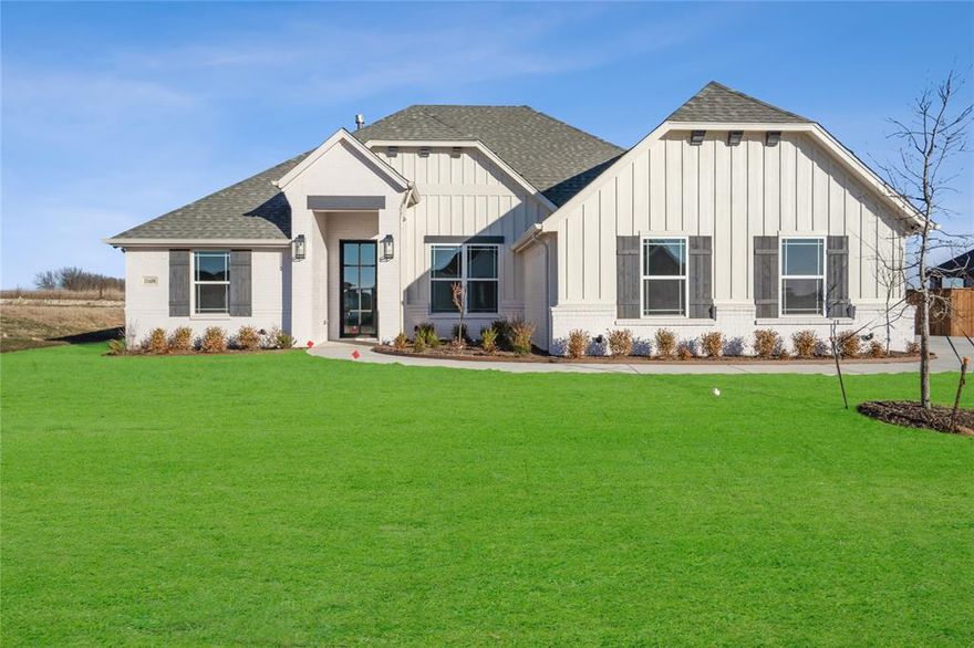 If you are looking for a quality home, with luxury design and family appeal, this is it! Modified Kingsburg Classic Series; This home is a Modified Kingsburg Couto Homes floor plan in the Wildcat Ridge Subdivision located in Godley. This home has 4 bedrooms, 3 bathrooms and a 2 car garage, a study, and 2573 square feet living space. Beautiful, vaulted ceiling with wood beam in the living and kitchen area, light painted cabinets, wood vent-a-hood. Large stylish light fixtures.  The kitchen, bathrooms and utility room contain granite counters throughout. It has a combination exterior of painted brick and board and batten, with stained beadboard porch ceilings and an iron front door. Located in gated subdivision with plans of a clubhouse, community pool and three ponds with walking trails. This location would be ideal for those that commute to the metroplex but want to return home to peace and quiet.