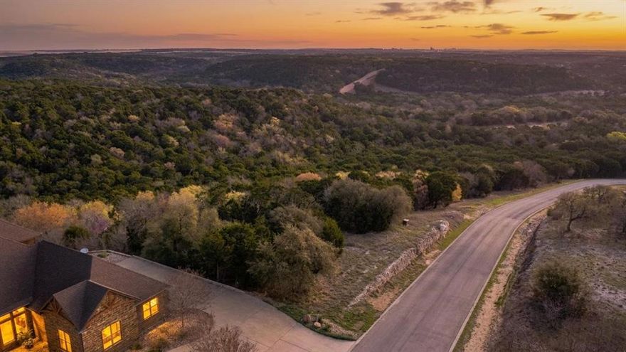 Amazing opportunity to own a lot with spectacular hill country views! Water and electricity on-site. Easy 45 minute commute to the Metroplex. No build timeline allowing you to build when you are ready. Enjoy the ranch lifestyle without the maintenance. The Retreat is a gated 3,400 acre resort community host to a championship 18 hole golf course designed by PGA Tour Pro Harrison Frazier. Voted best value club by Avid Golfer Magazine with golf membership for only $175 per month! Other amenities include beautiful clubhouse with restaurant, 2 community pools, fitness facility, playground, miles of hiking trails, 24 hour security, pro shop, fishing ponds, tennis, pickle ball and basketball courts. Come build your dream home on this gorgeous lot in The Retreat and enjoy the wonderful community!