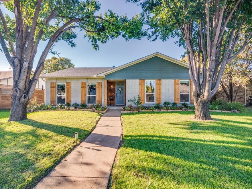 Wow!  This incredible and spacious home located near the heart of Rowlett checks ALL the boxes!  This gorgeous property has been beautifully  and thoughtfully updated over the past few years and offers a wonderful and open floorplan that makes entertaining a breeze!  Two huge living areas (one with a stunning fireplace), two very large dining areas (one with a serving bar and sink), and four bedrooms make this home extra special.  The open kitchen provides a window overlooking the back yard and convenient access to the separate utility room.  Some of the recent updates include: Landscaping in 2021 & 2025, Flooring in 2023, Insulation in 2024, Patio Cover & Lighting in 2024, Irrigation in 2025, UV Lighting in HVAC in 2025...and more!  Foundation was repaired by previous owner with transferable warranty!  Enjoy morning coffee on your patio and evenings shopping and dining in nearby downtown Rowlett.  This home is a showplace and is located in the sought after Westwood Estates near Lake Ray Hubbard.